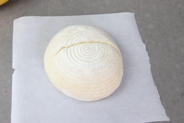 No-knead sourdough after being scored