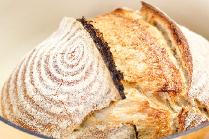 Loaf of sourdough bread in a dutch oven