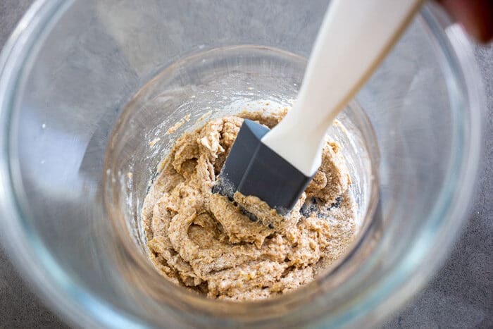 Feeding the starter to prepare for baking