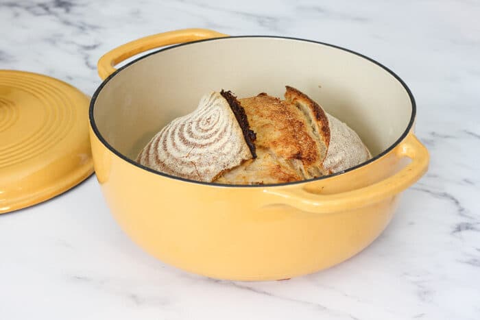 Baked loaf of sourdough that was baked in a pot that wasn't preheated
