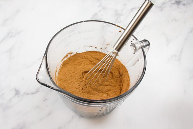 All of the dry ingredients for the chocolate whoopie pies in a mixing bowl after being whisked together.
