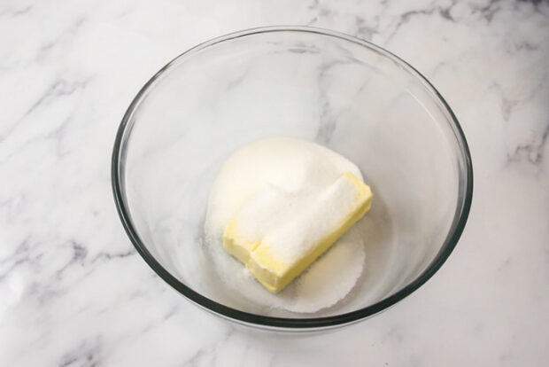 Butter and granulated sugar in a large mixing bowl before being mixed