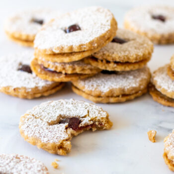 Beauty shot of Hazelnut Linzer cookies sandwiched with jam