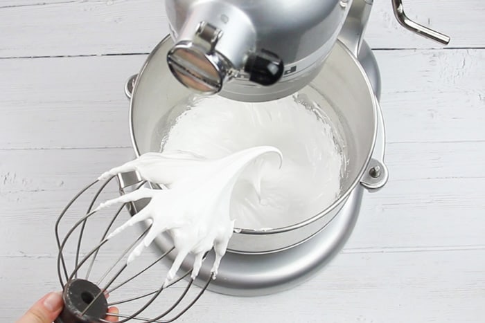 Meringue holding its shape off the end of a whisk
