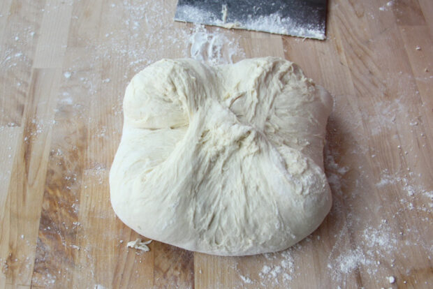 A round dough ball after pinching the side closed together