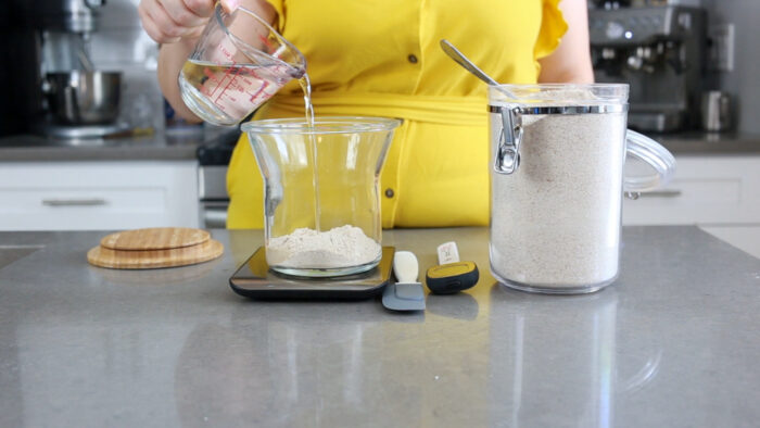 making a sourdough starter with water and flour