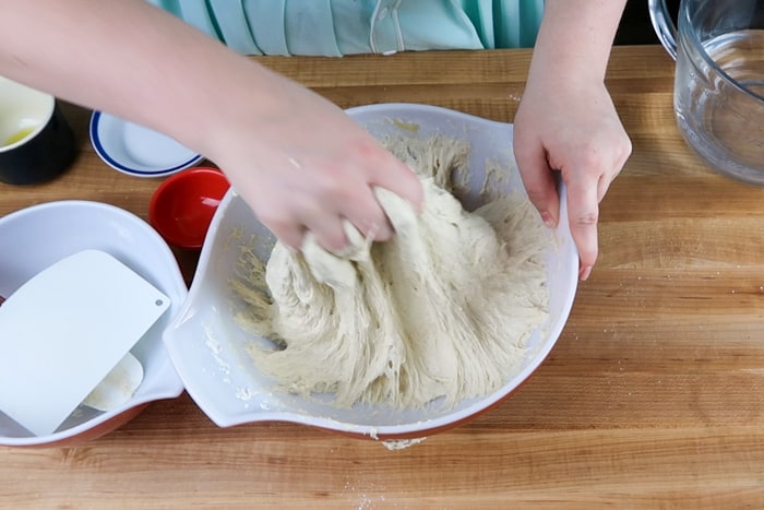 Dough being mixed by hand