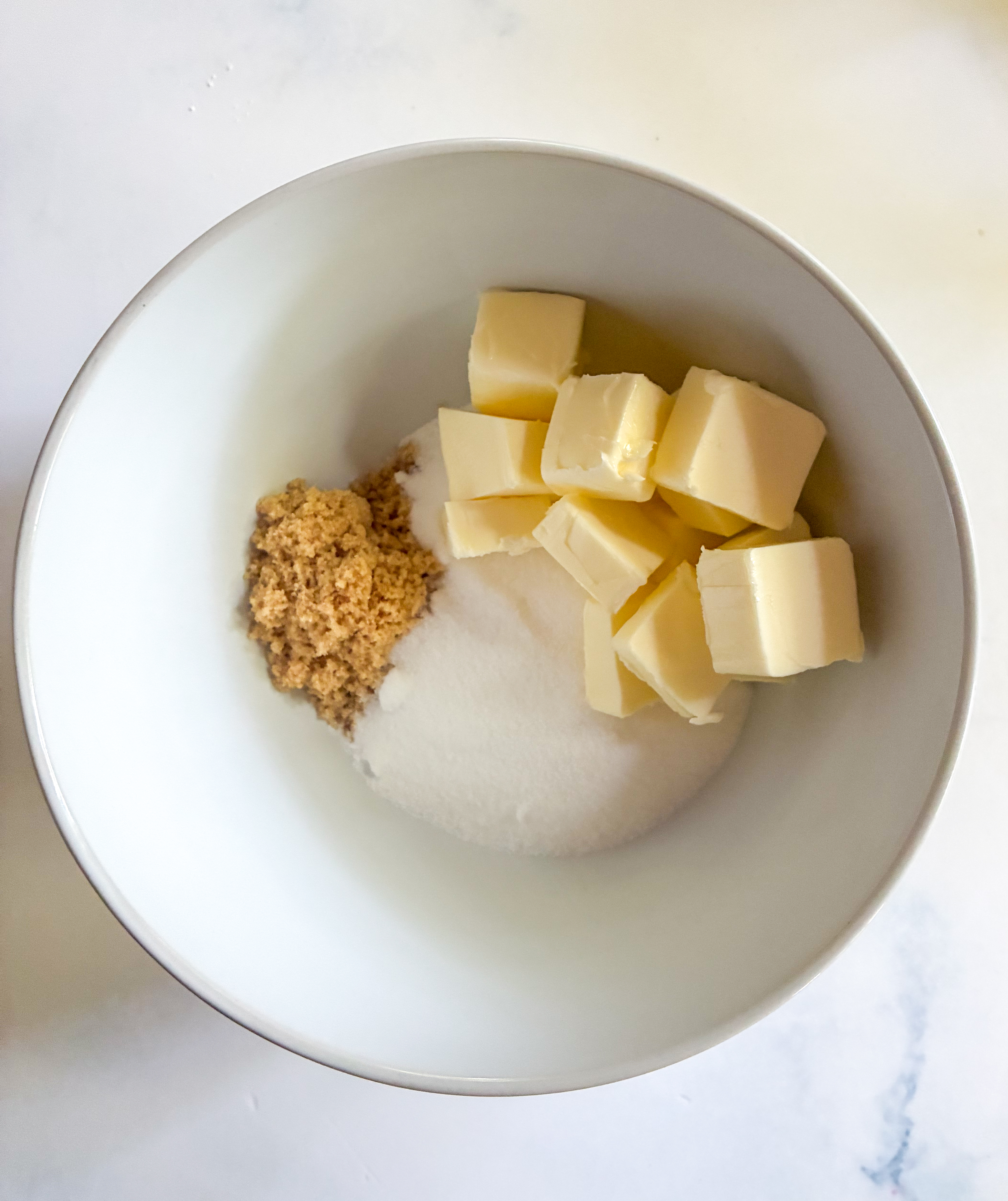 soft butter and sugars in a mixing bowl