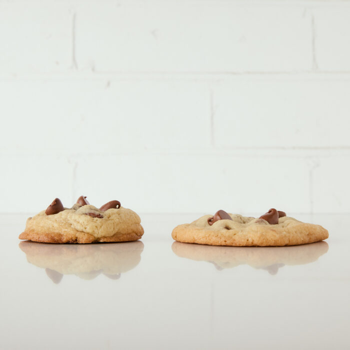a thick and cakey cookie on the left side, a thin and crispy cookie on the right side