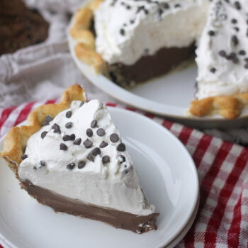 a slice of chocolate cream pie