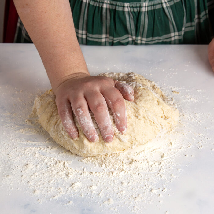 Kneading the dough by hand