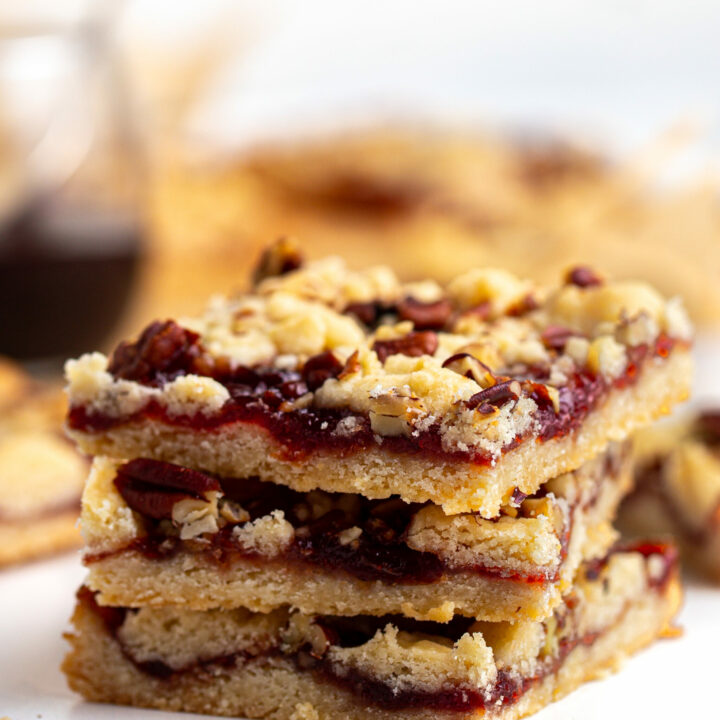 shortbread crumb bars cut into squares and stacked on top of each other