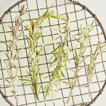 Sugared rosemary on a wire rack