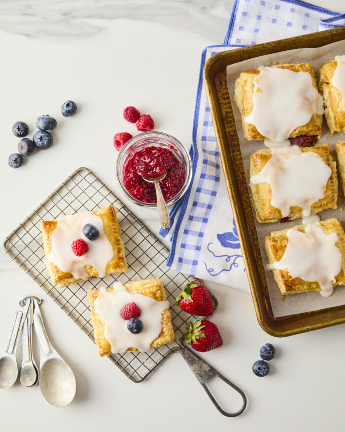 pop tarts topped with glaze and fresh berries