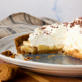 a closeup of the layers in a banoffee pie