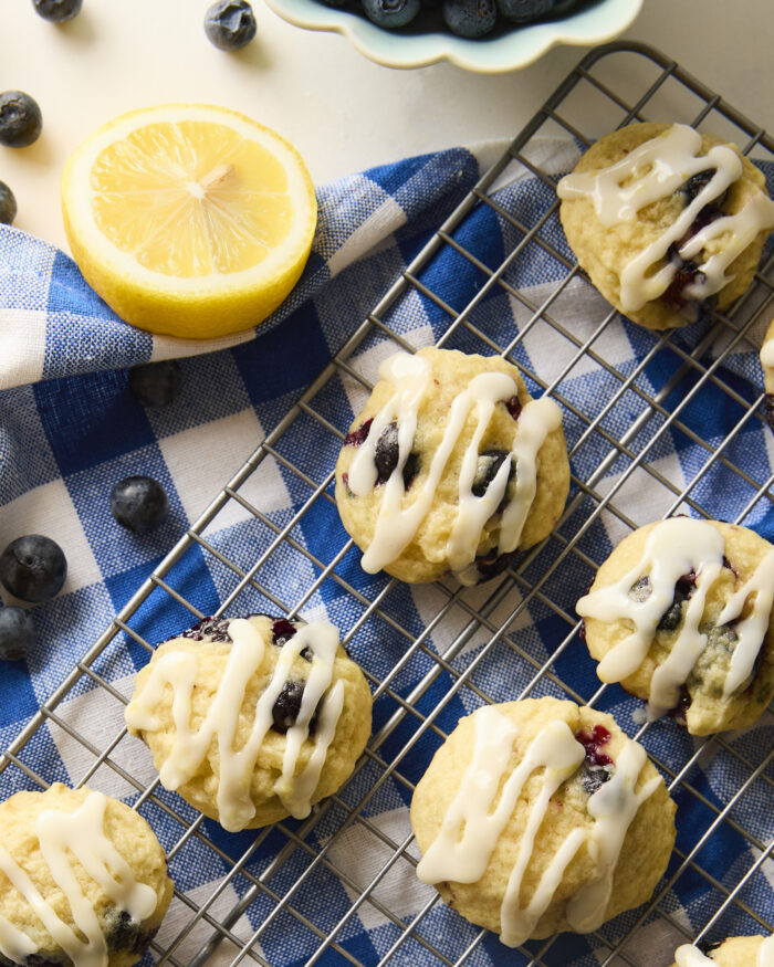blueberry cookies with lemon glaze on a wire rack