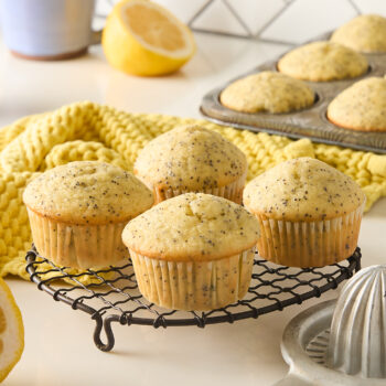 lemon poppy seed muffins on a rack
