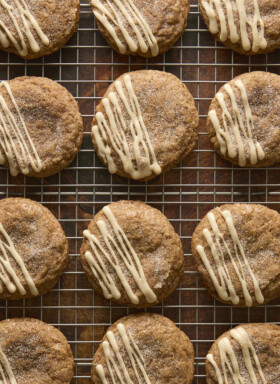 chai cookies with maple glaze on a wire rack