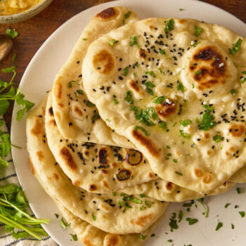 garlic naan on a plate